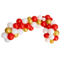 Curved balloon garland arch featuring red, white, and metallic gold balloons