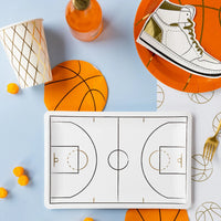 Hoops table with court tray and sneaker paper napkins for game-day snacks.