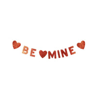 Be Mine glitter banner with red glitter letters and heart shapes on string