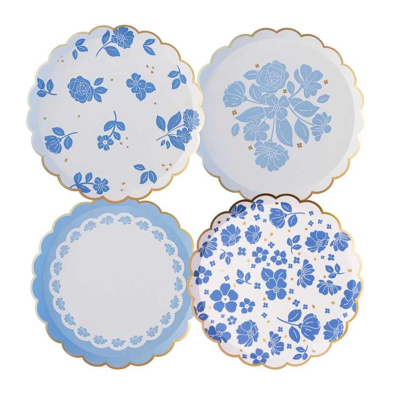 Product grid showing four Belle Blue floral dessert plate designs with gold scalloped rims.