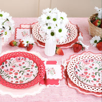 Strawberry Cocktail Napkins styled on a pink striped table for a Berry First Birthday party.