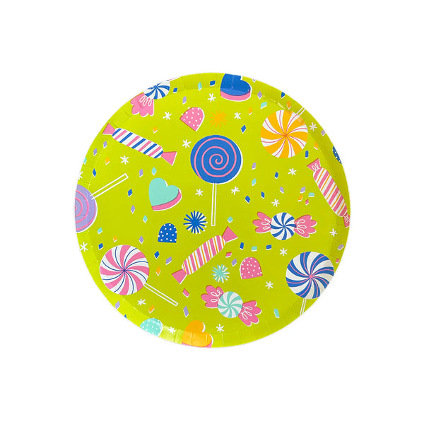 Isolated neon-lime 8-inch paper plate covered in colorful candy illustrations—lollipops, wrapped sweets and confetti on white background.