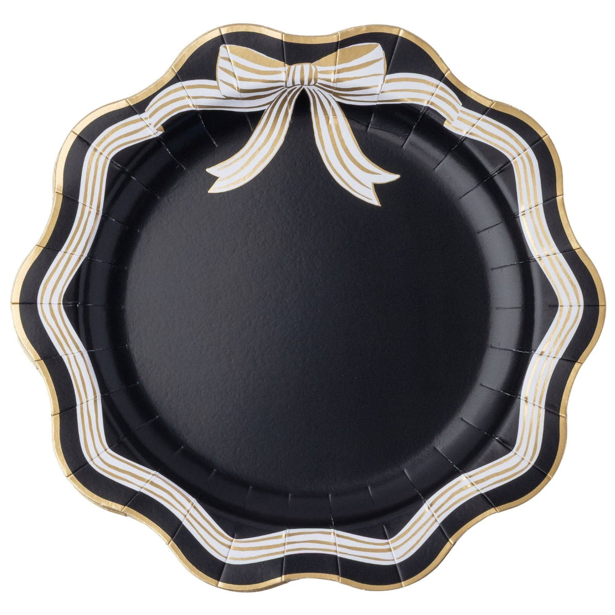 Black bow dinner plate with a black, white, and gold striped scalloped rim and a gold-and-white striped bow at the top, gold-trimmed edge, overhead view on white background.