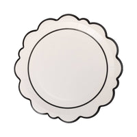 Round white paper plate with scalloped edges and a thin black border.