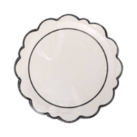Packaged set of Black Edge 11-inch scalloped paper plates in clear plastic wrapper.