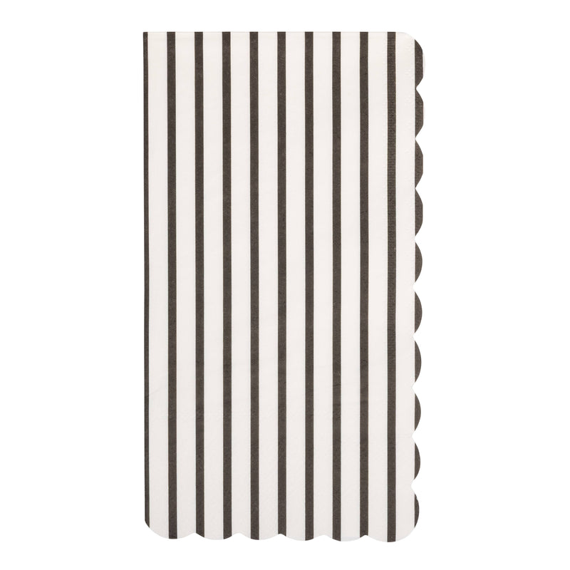 Single rectangular black and white thin striped paper guest towel with scalloped edges on white background