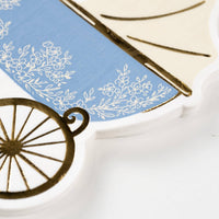 close up of floral detail on blue baby napkin
