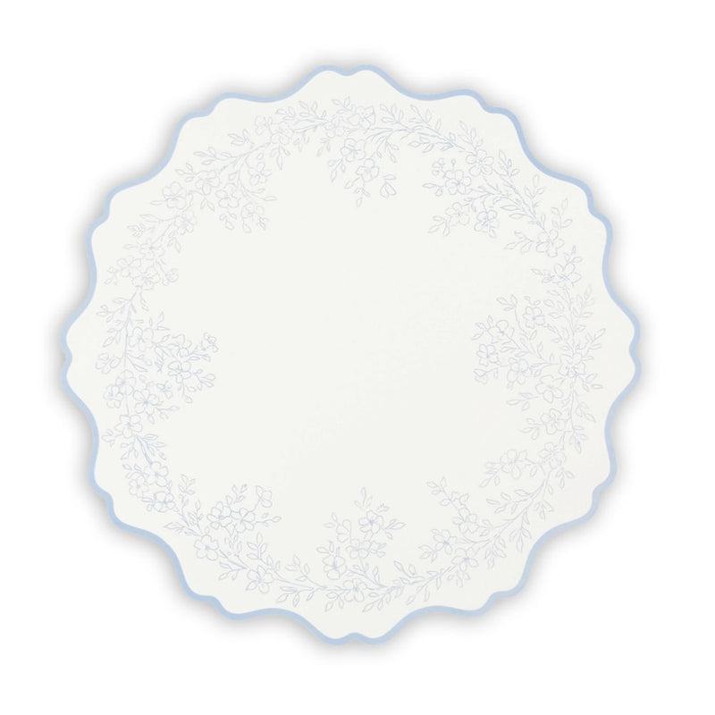 blue floral scalloped placemat with botanical wreath design.