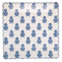 Blue flower block print square Easter paper plate with scalloped edges on white background.
