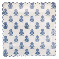 Packaged blue flower block print square paper plates with scalloped edges.