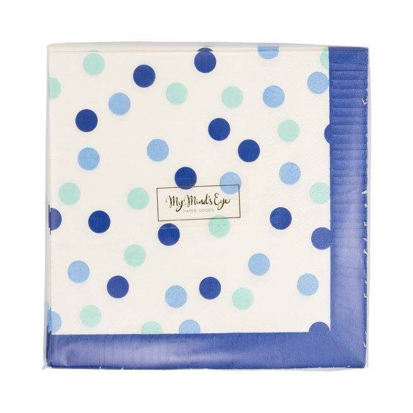 Blue polka dot fringe paper cocktail napkins in packaging showing cream base with navy, light blue, and mint dot design