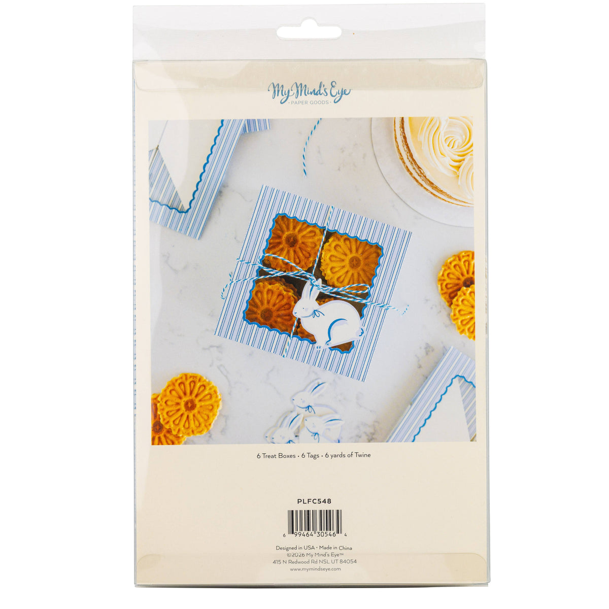 The back of the My Mind's Eye retail packaging for 6 blue stripe treat boxes, showing the windowed design and included tags and twine.