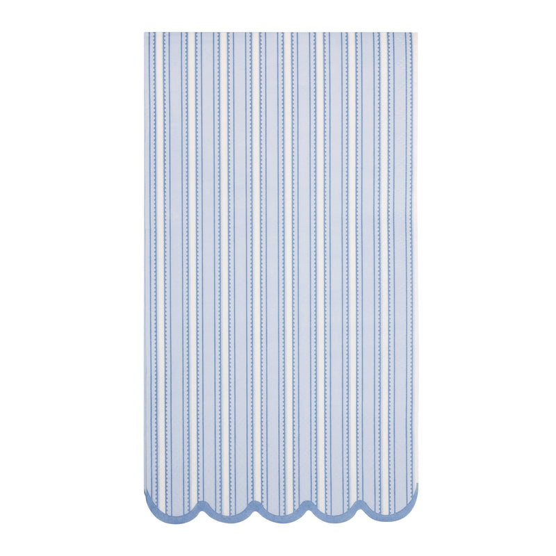 Blue striped Easter dinner napkin with scalloped edge on white background.