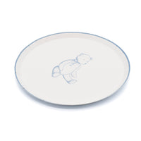 Blue teddy bear paper dessert plate at an angle on white, showing the 8.5 inch round shape
