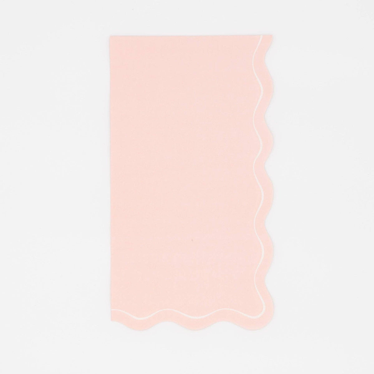 Solid blush pink guest towel with a flowing scalloped white-outlined edge, flat view on white background.