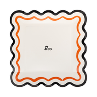 Boo Halloween paper plate with orange squiggle border and black scalloped edge on a white background.