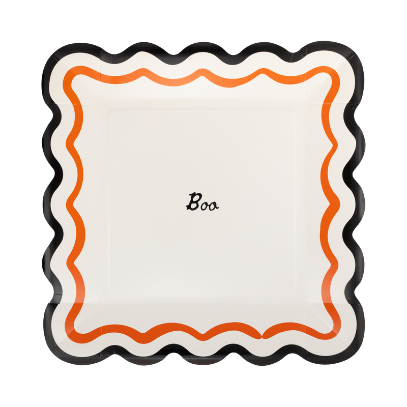 Boo Halloween paper plate with orange squiggle border and black scalloped edge on a white background.