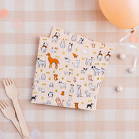 Bow Wow dog napkins styled on a table for a puppy birthday party