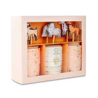 Side view of dog cupcake decorating kit box showing illustrated puppy designs