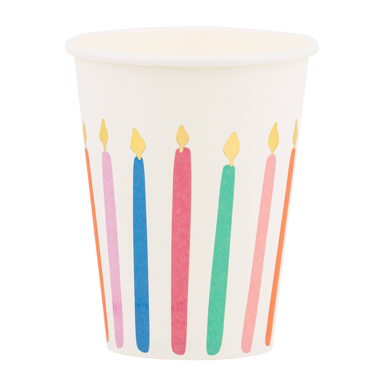 A single white paper cup from our Bright Birthday party cups set featuring colorful candles with gold foil flames.