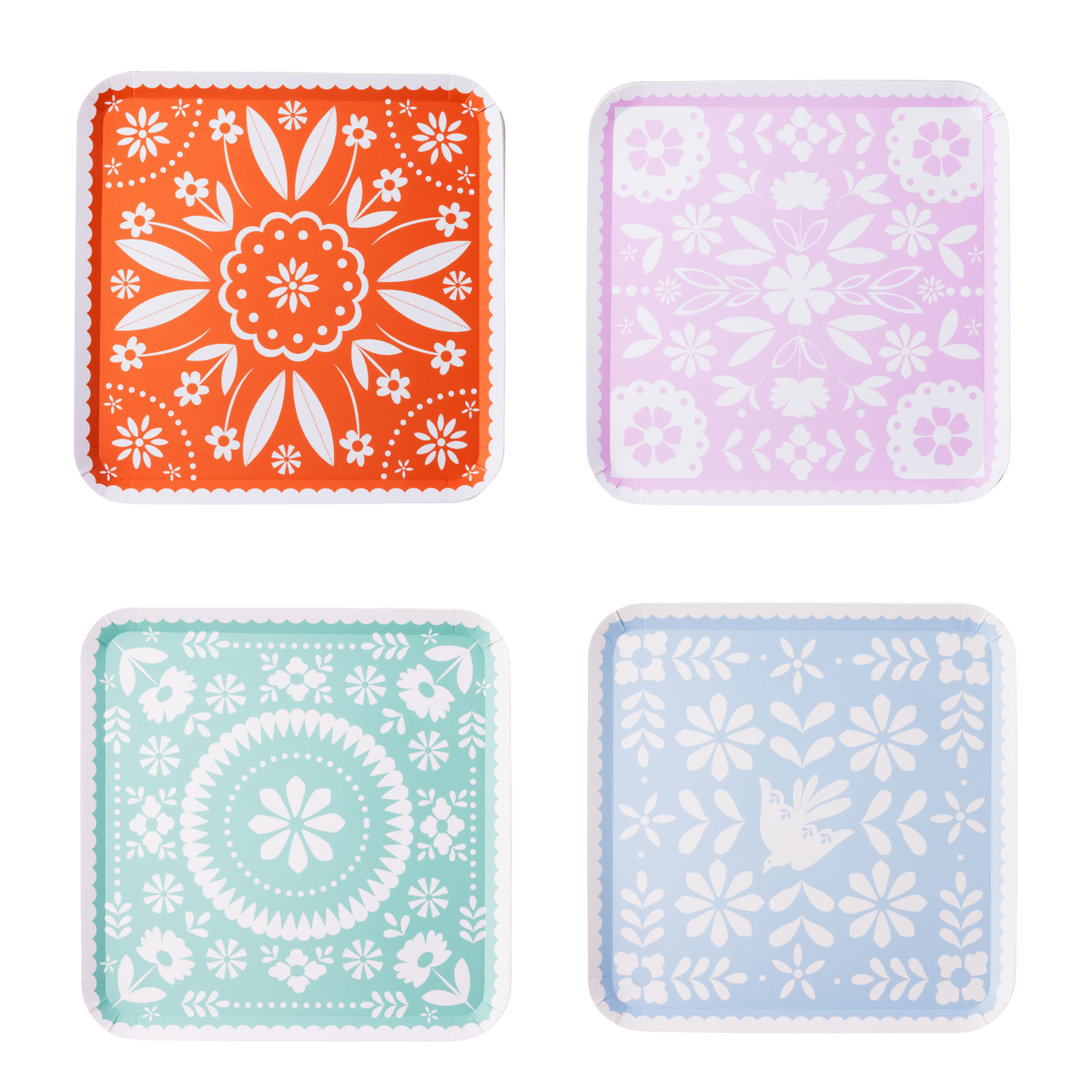 set of colorful fiesta party plates in orange purple mint and blue with folk inspired patterns
