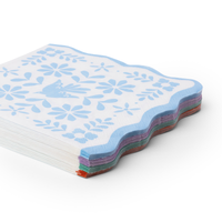 stack of bright fiesta large paper napkins showing multicolor layered edges