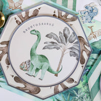 Brontosaurus plate layered with jungle themed party decor