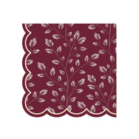 Burgundy lunch napkin with an allover etched white leaf print and cream-lined scalloped edge