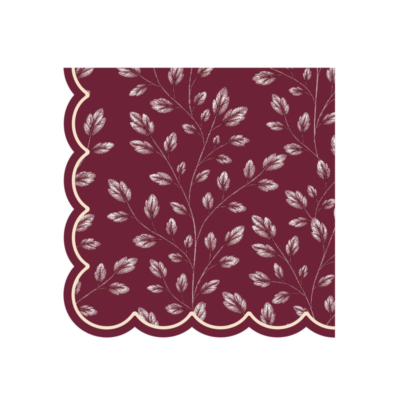 Burgundy lunch napkin with an allover etched white leaf print and cream-lined scalloped edge