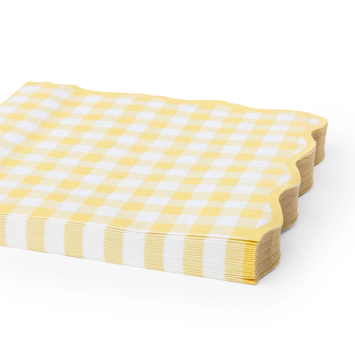 Butter yellow gingham napkins shown folded and stacked at an angle
