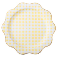 Butter yellow gingham paper dinner plate with a scalloped edge, shown top-down