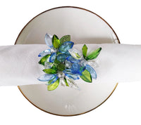 Blue and green jeweled napkin ring on a silver napkin ring - perfect for a Spring table or Mother's Day Brunch decor.