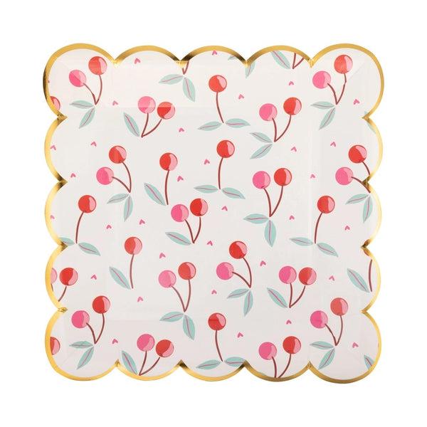 Square scalloped paper plate with colorful red and pink cherries, green leaves, small pink hearts, and gold foil edges, perfect for cherry party decorations.