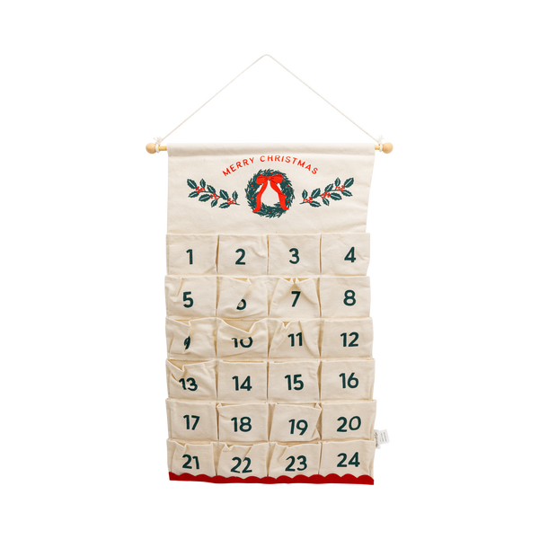 Cream canvas Christmas advent calendar banner with 24 numbered pockets, wreath design, and red scalloped hem