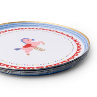Close-up side view of stack of Petite Playground carousel horse paper cake plates showing pink spring carousel horse design with red saddle, red scalloped border with classic toy iconography, multicolor confetti dot ring, blue stripe edge, and gold foil rim