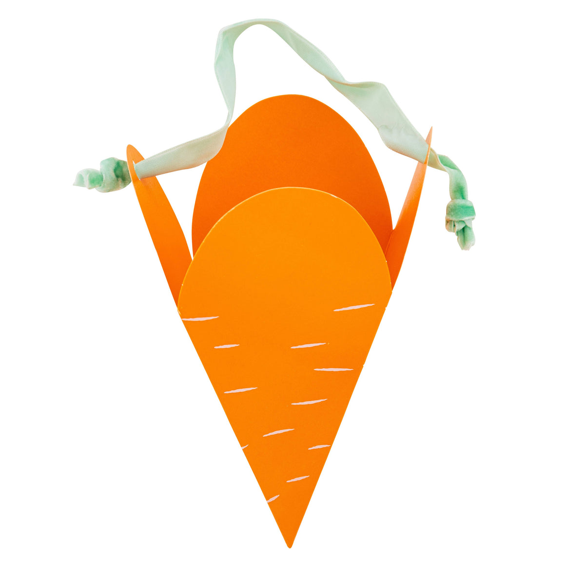 Orange carrot-shaped paper treat box with green ribbon tie on white background