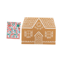 Gingerbread placemat and coordinating sticker sheet displayed side by side, showing the house outline and festive stickers.