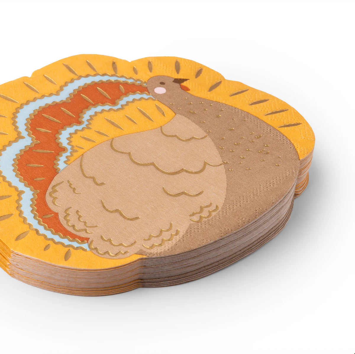 Stack of gold-accent turkey shaped napkins in warm autumn colors, angled close-up.