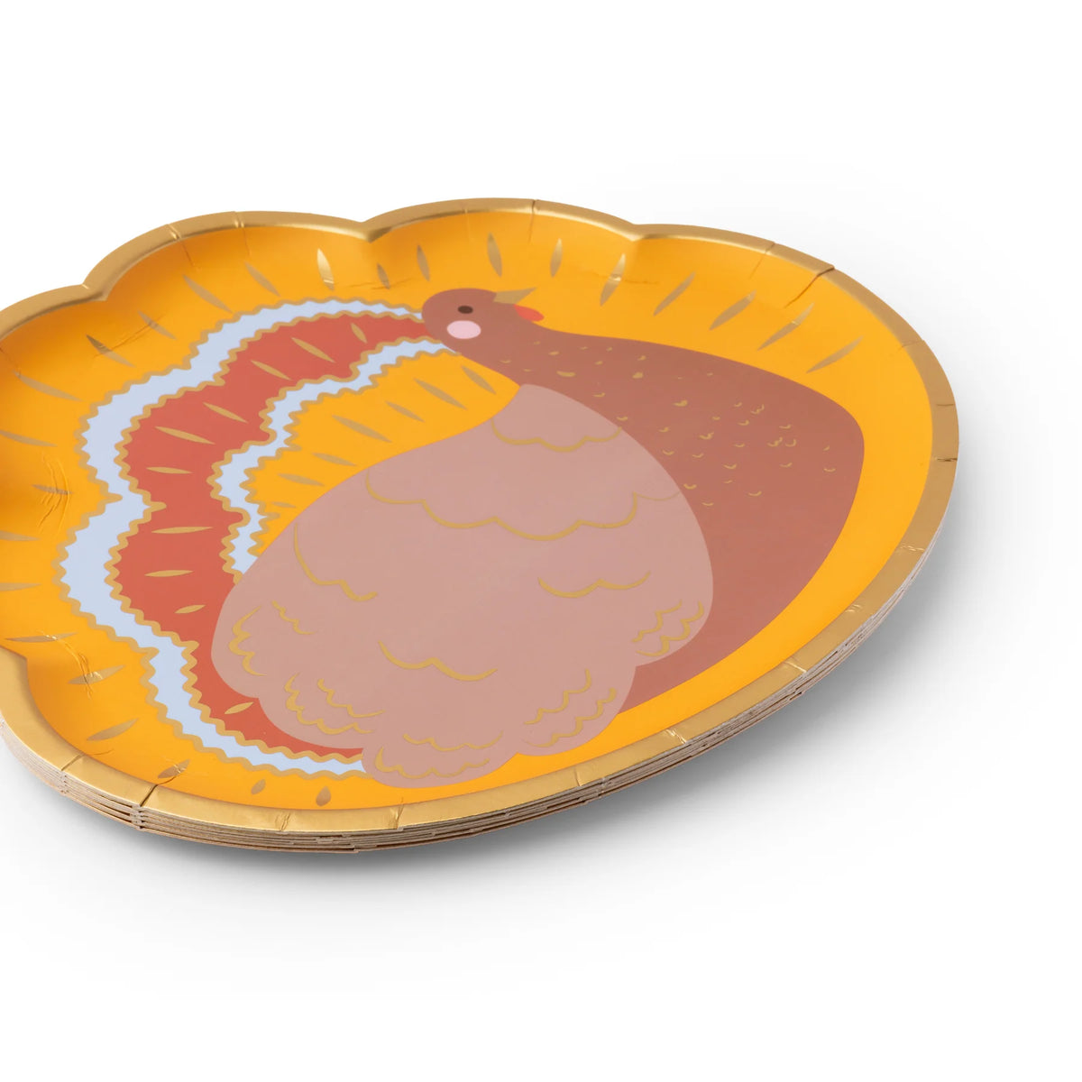Close side view of turkey plate showing metallic gold rim and tail details.