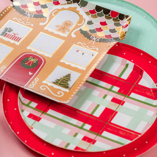 Close-up of dotted plate stack with plaid dessert plate on top.