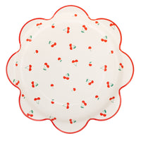 Cherry pattern scalloped paper plate with red cherry design on cream background.
