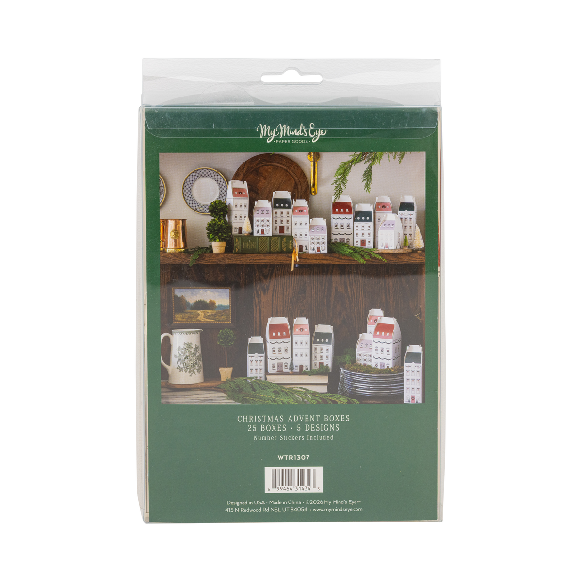 Back of a Christmas house advent box set package showing the boxes styled on shelves
