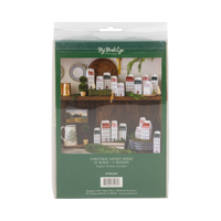 Back of a Christmas house advent box set package showing the boxes styled on shelves