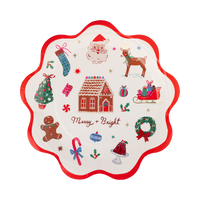 Cream paper plate with retro Christmas icons, Merry + Bright script, gold foil stars, and a wavy red edge