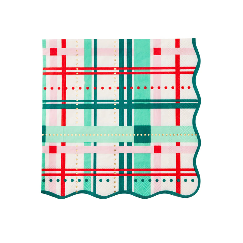 Single scalloped Christmas plaid napkin with red, green, and pink holiday plaid design.