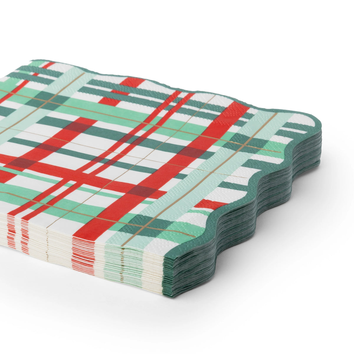 Classic Christmas plaid napkins shown folded and stacked at an angle