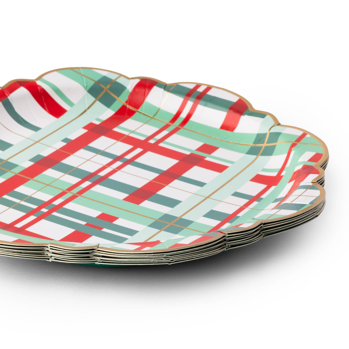 Angled stack of Christmas plaid scalloped paper dinner plates showing the gold foil rim