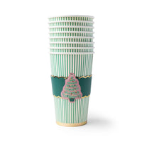 Stacked green and white Christmas tree coffee cups