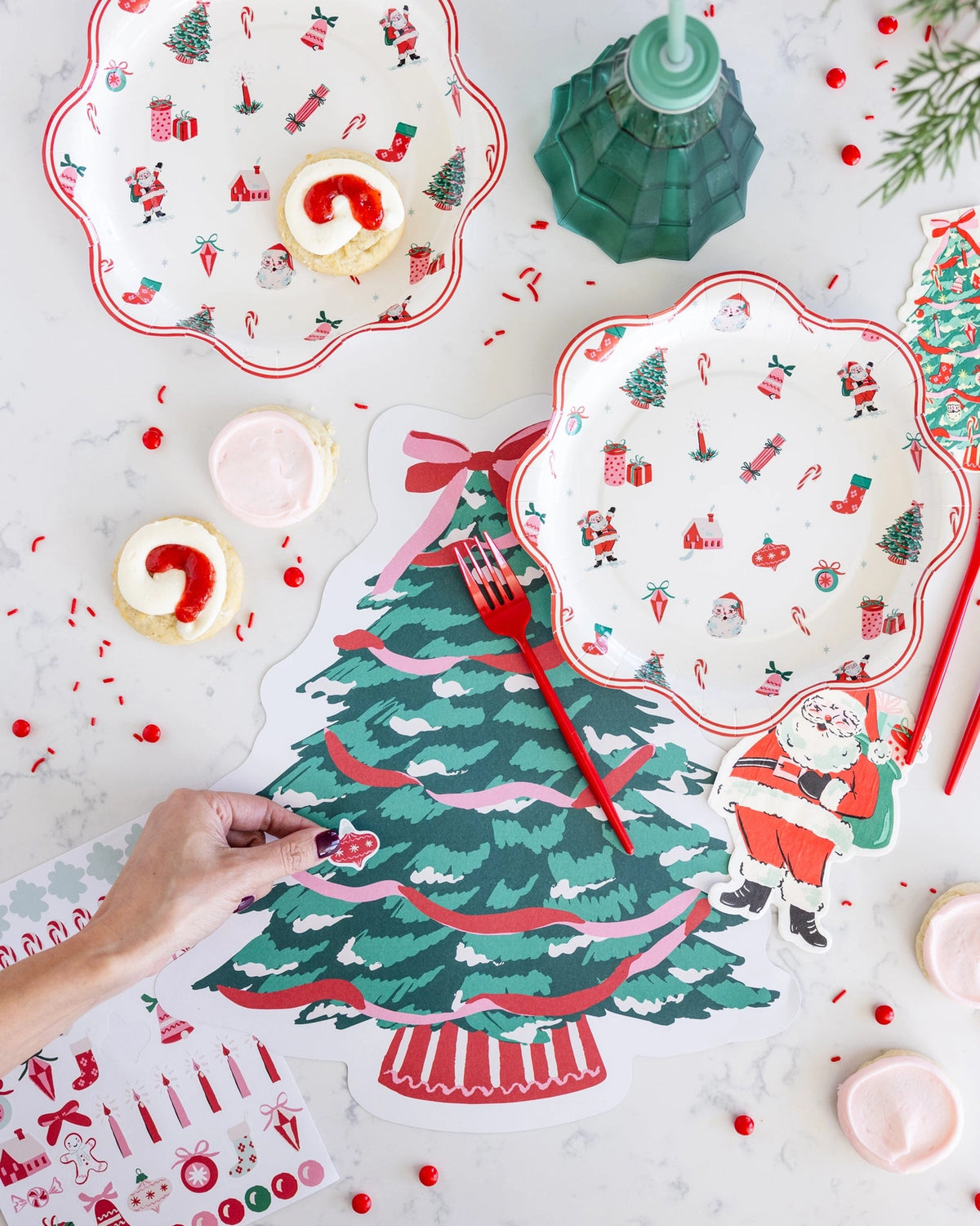 Christmas tree placemats styled on a kids party table with holiday decor