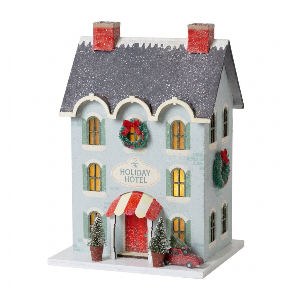 Blue glitter Holiday Hotel putz house with silver roof, wreaths, striped awning, and red car with tree